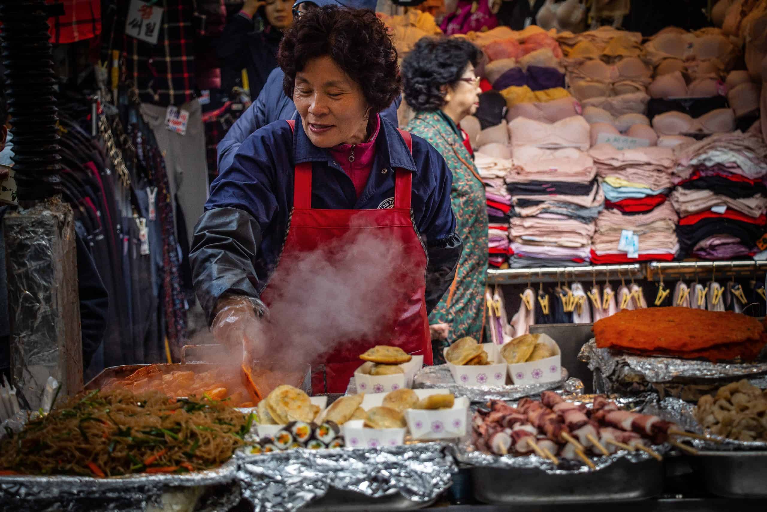 Woman preparing food in market