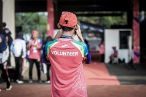 Volunteer taking a photograph