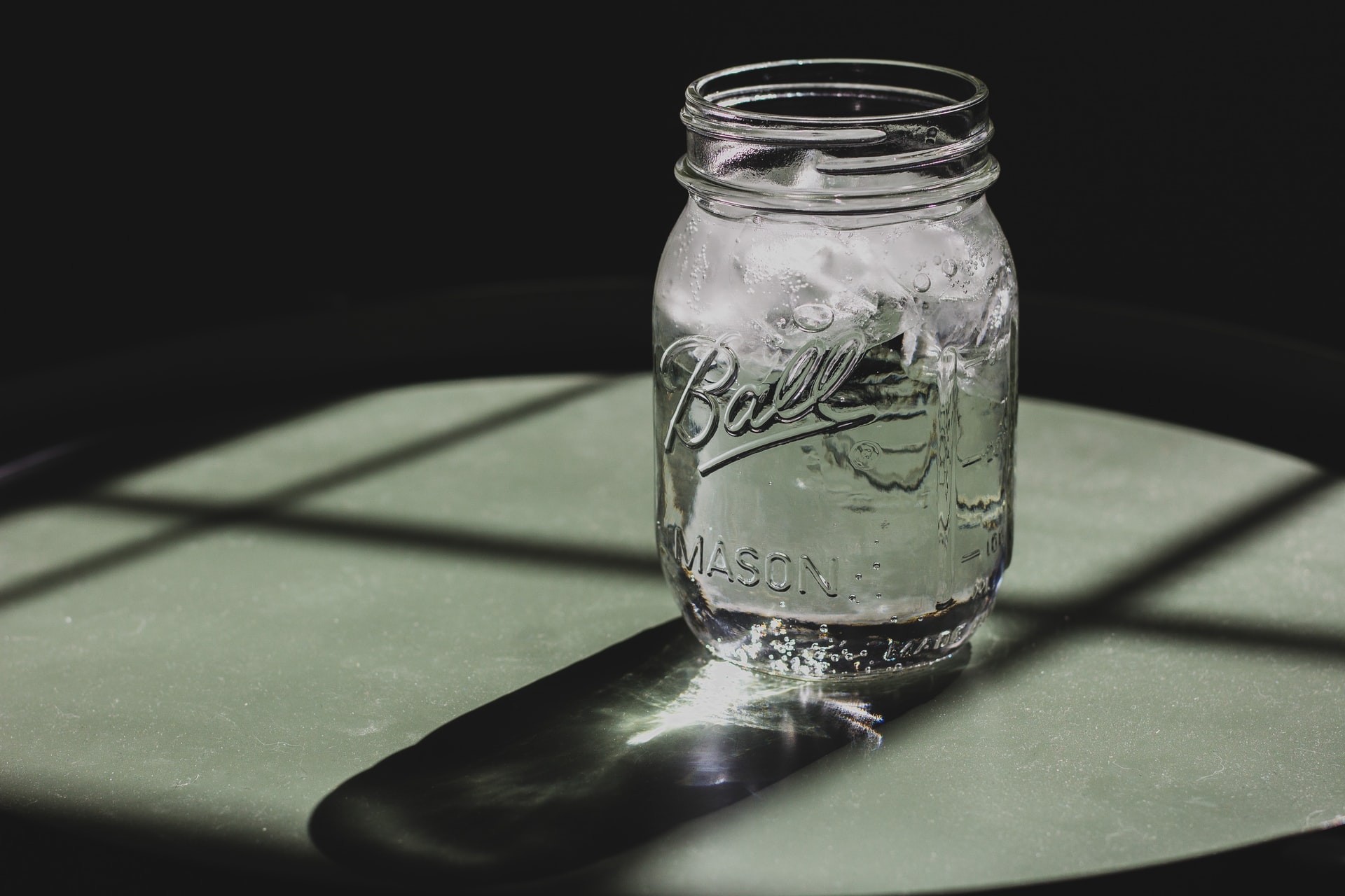 Mason jar of iced water