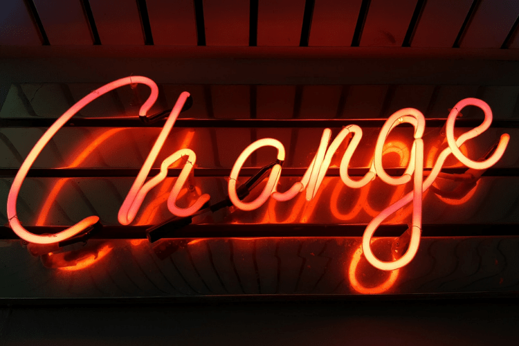 Neon lights that read, "Change"
