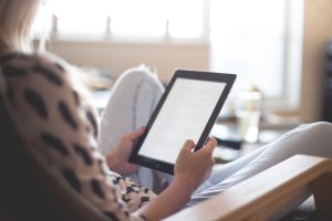 Woman reading on an iPad